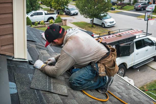 Professional Gutter Repair And Installation technician working in Penhook, VA